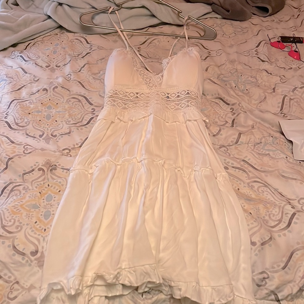 Beautiful white dress faded rose I wanted it to fit me but it just didn’t